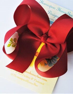 A beautiful Cranberry Red Large Ribbon Bow by Homespun HoneyBee Designs