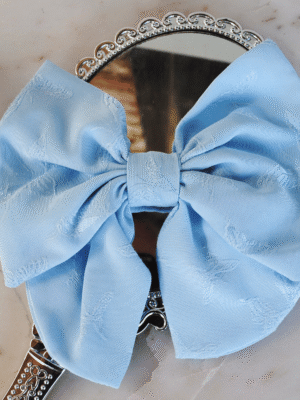 Large Light Blue Claire Hairbow with embossed butterflies on satin fabric