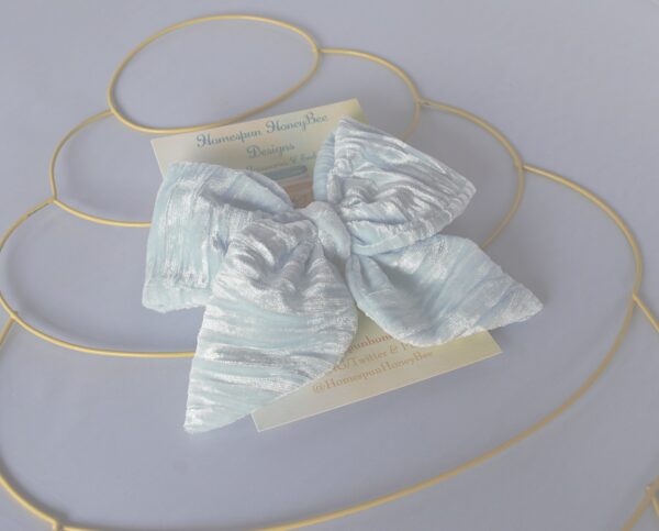 left side angle shot of handmade velvet bow