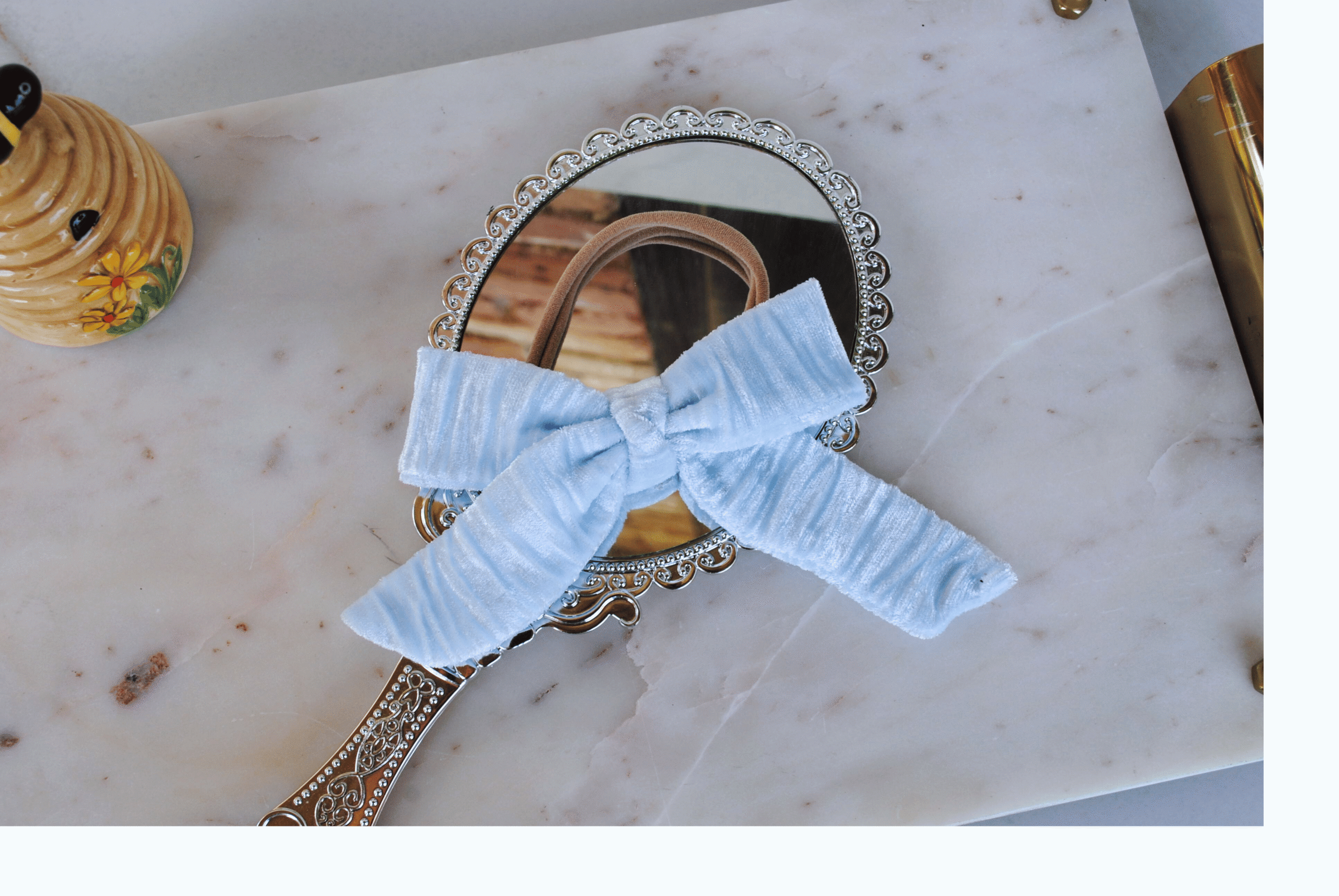 an icy blue velour luxe baby headband
