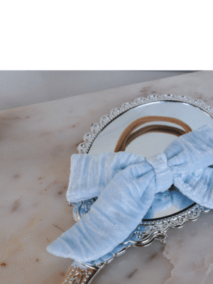 Hand Tied Velour Baby Headband Blue Flat Side view of luxe baby headband in Ice Blue Velvet