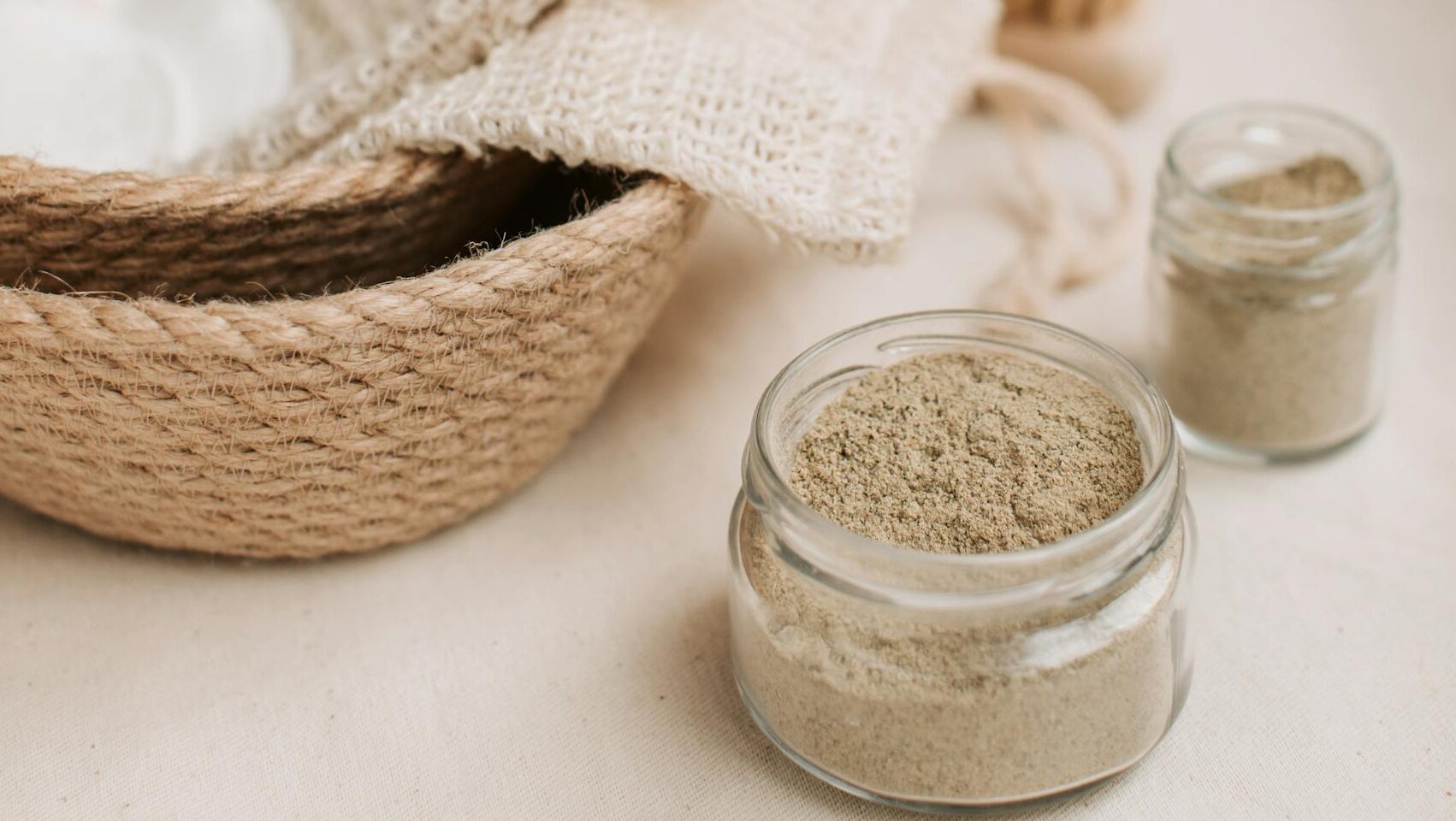 Elegant display of natural skincare products on a soft, neutral background.